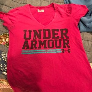 Under armour shirt with small bleach stain on back